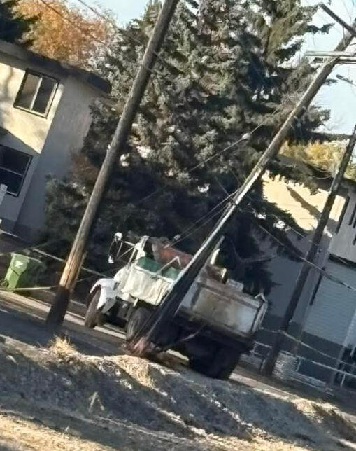 Uh Oh! work vehicle knocks down electrical pole